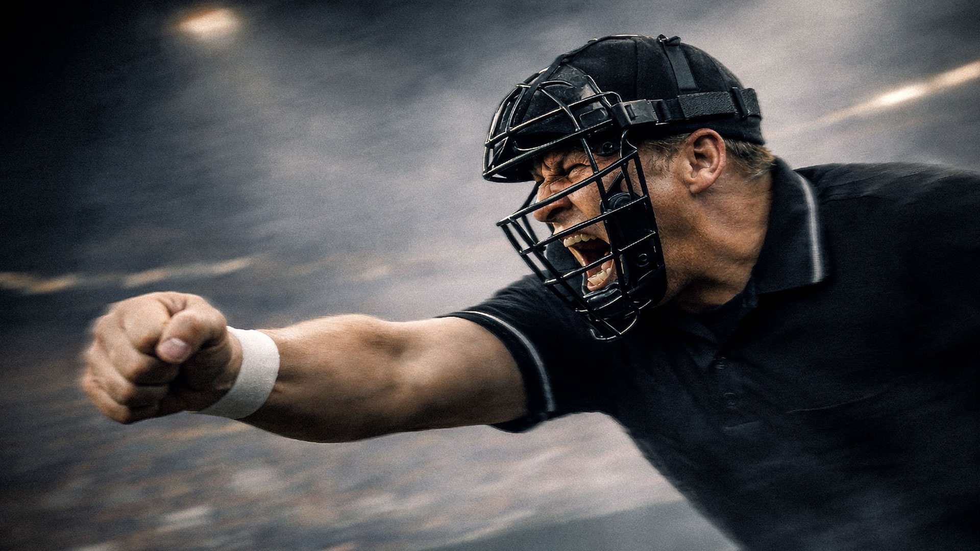 Umpire calling a strike